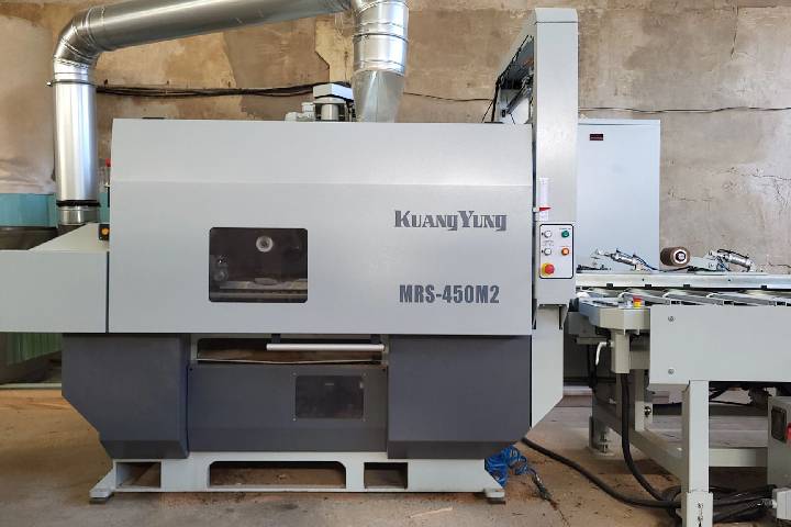 High-precision laser-guided ripping saw in action, ensuring accurate wood cutting and optimized material usage for modern woodworking production.