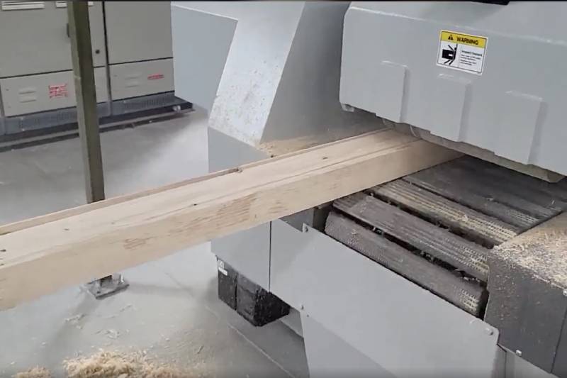 Multi-Rip Saw Machine in action, efficiently cutting wood with precision for high-volume woodworking production.